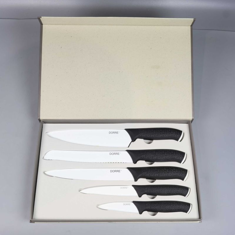 Femdelat knivset med vita blad och svarta handtag i ask