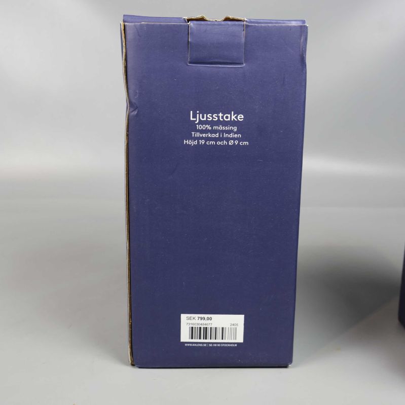 Baksidan av förpackningen med materialinfo på svenska