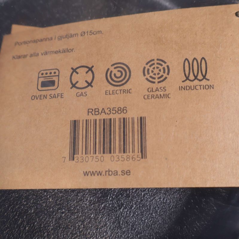 Etikett med symboler för värmekällor och streckkod