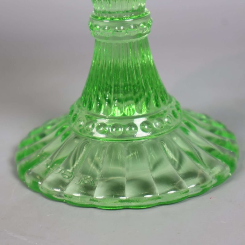 Närbild av grön fot med räfflor och bubblemönster