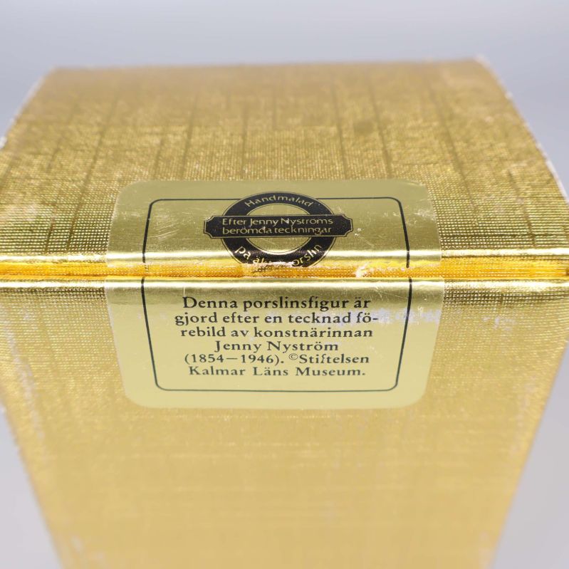 Närbild av bruten försegling med text