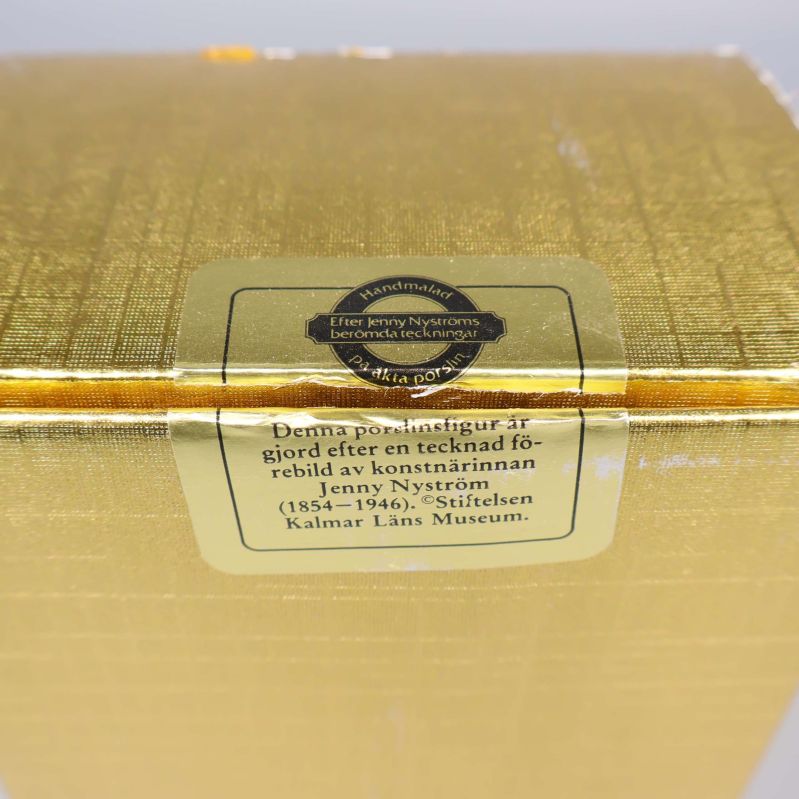 Närbild av bruten försegling med text