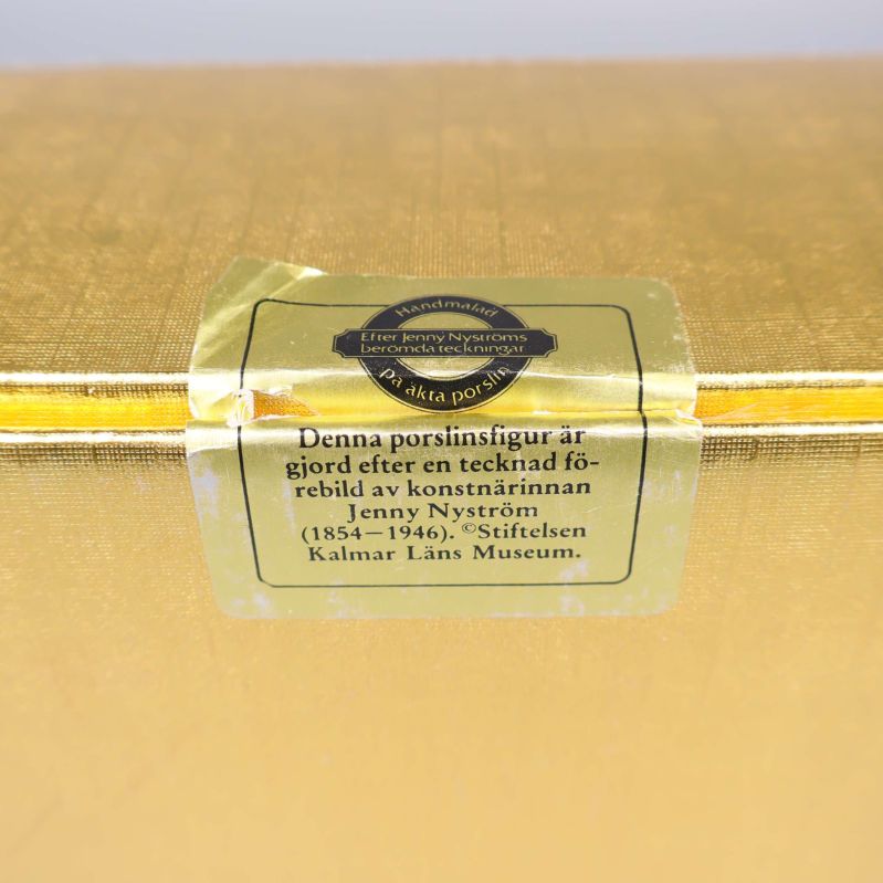 Närbild av bruten försegling med text