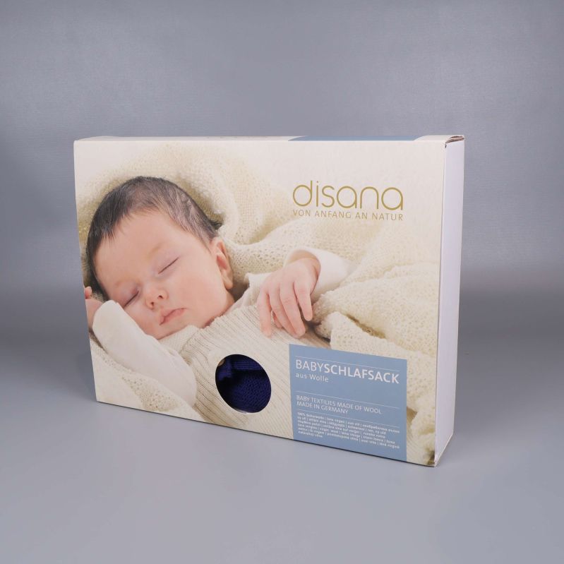 Framsida på förpackningen med baby och produktfönster