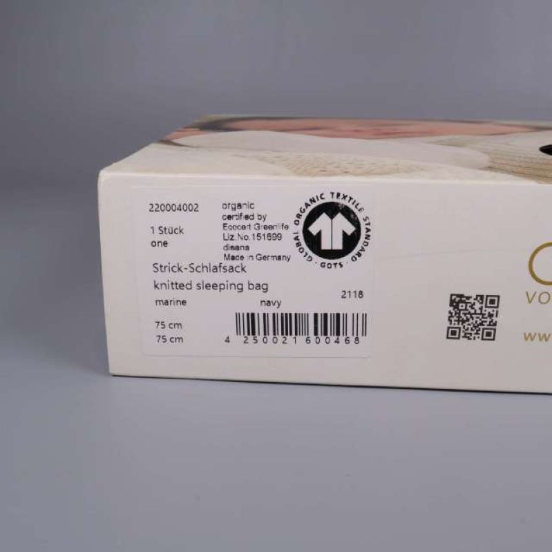 Förpackningssida med produktinformation och certifiering