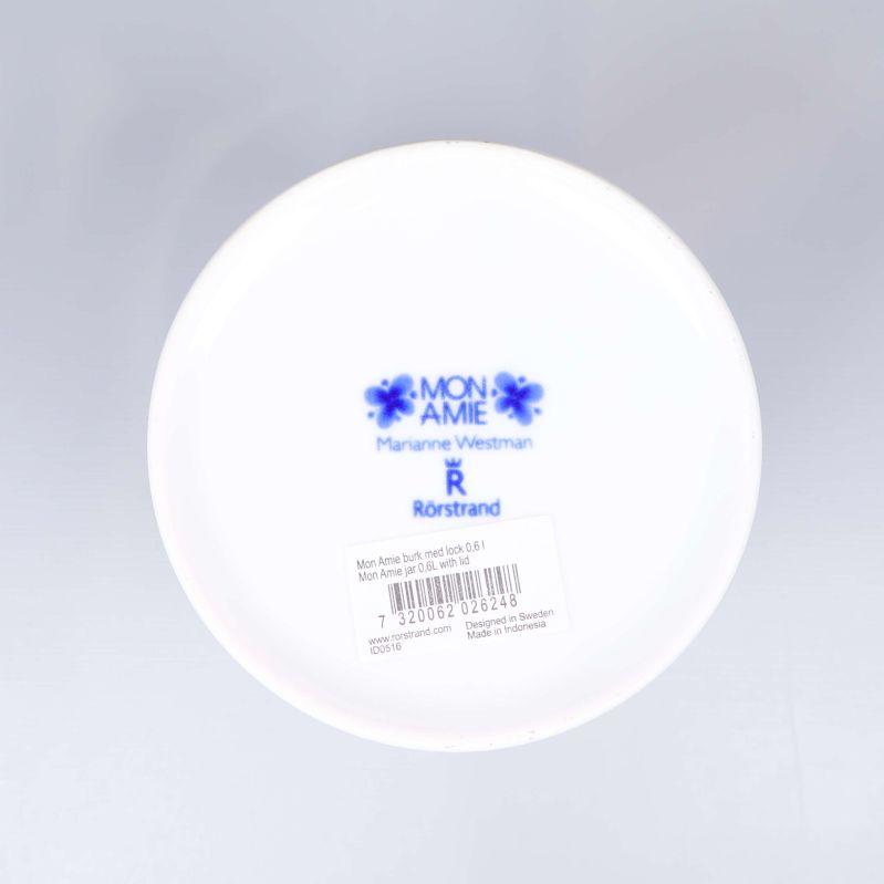 Botten med Mon Amie-stämpel och streckkodsetikett