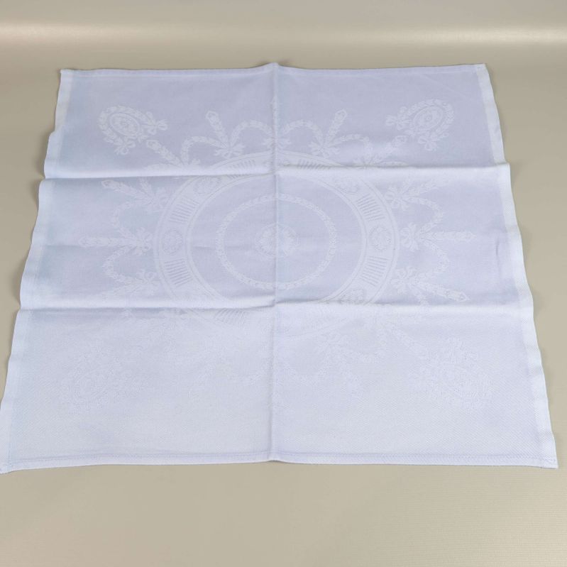 Utbredd blå linneservett med vävt mönster synligt