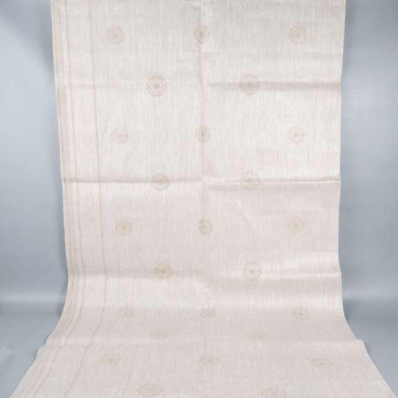 Utplockad linneduk med diskret blommönster