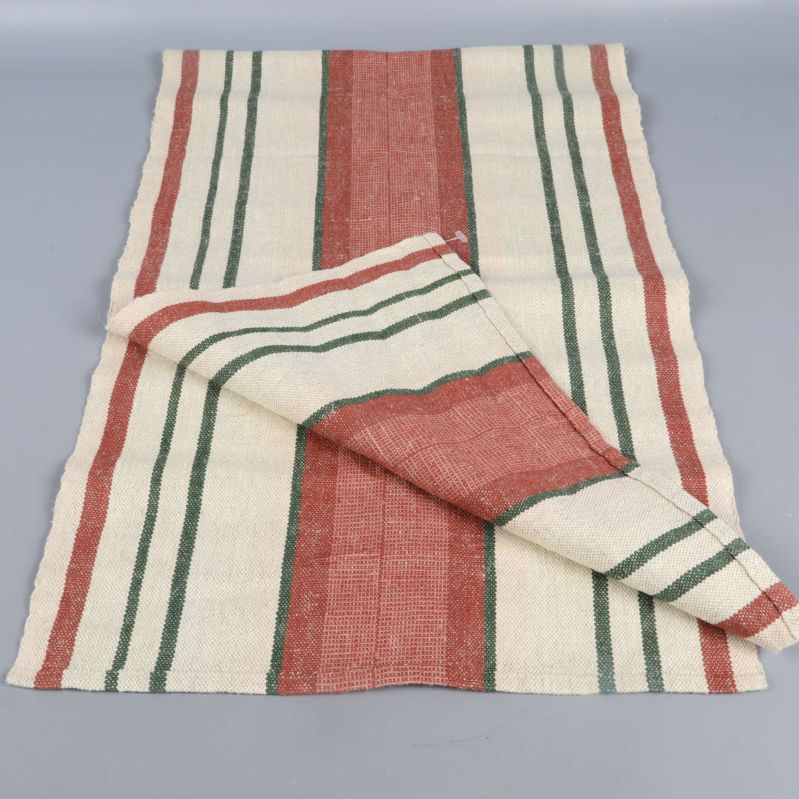 Löpare med röda och gröna ränder viks upp