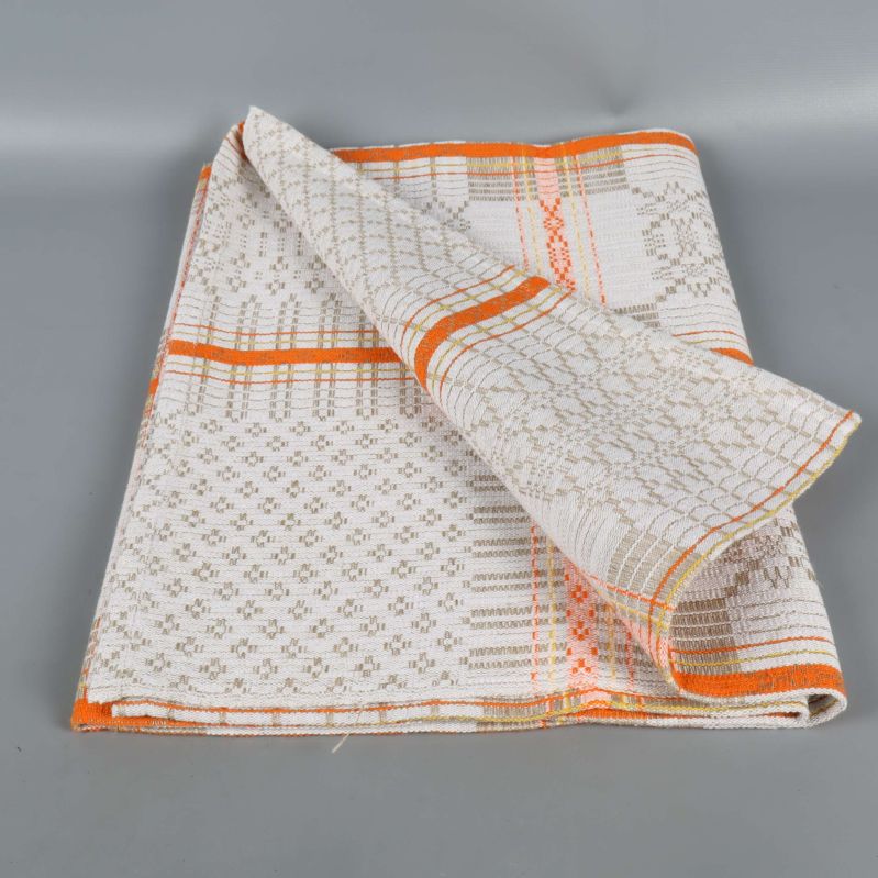 Köksduk delvis vikt för att visa båda sidor av mönstret