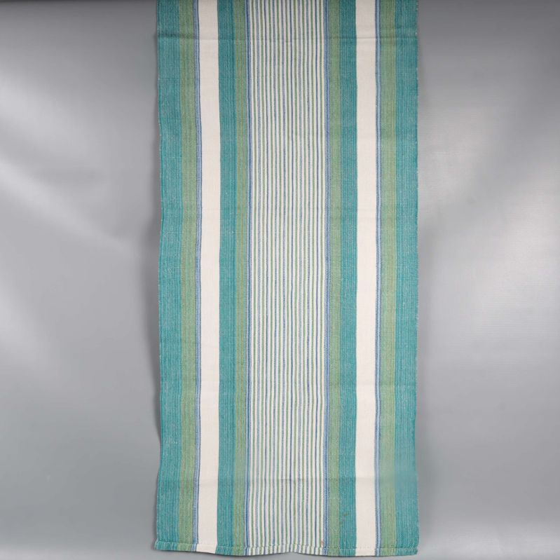 Lång randig löpare i grönt och blått hängande