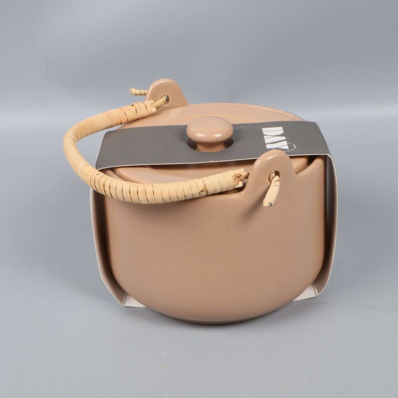 Tekannans baksida med handtag och etikett