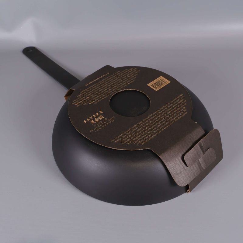 Baksida av panna med brun pappförpackning