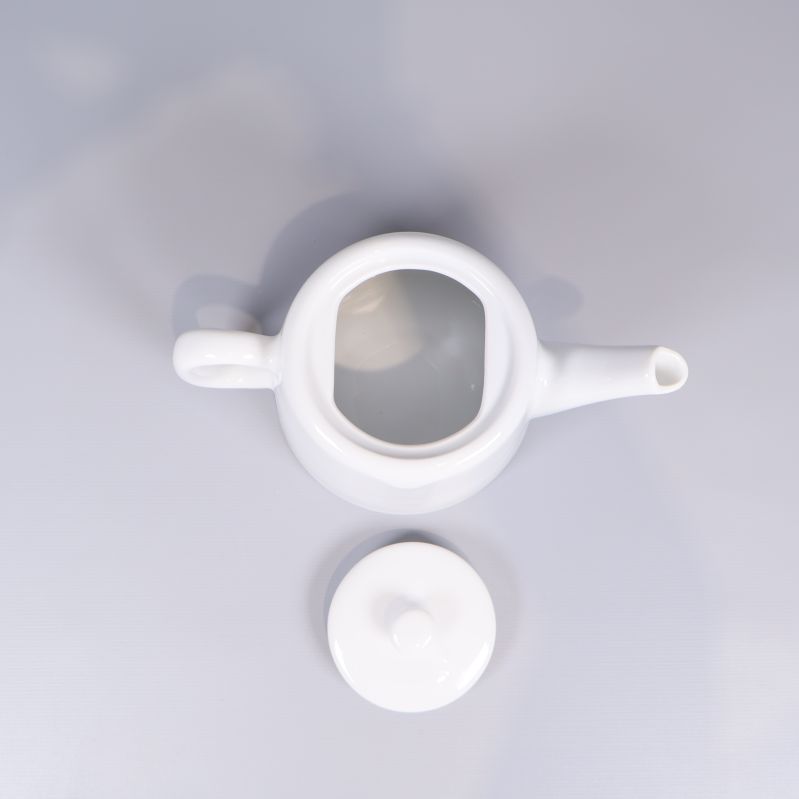 Tepotta ovanifrån med öppet lock