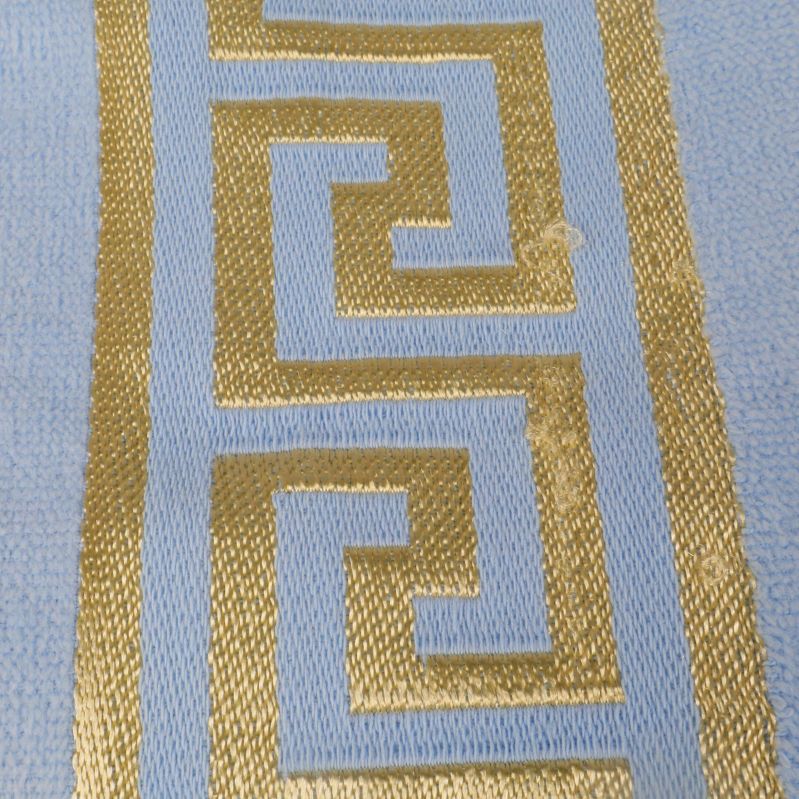 Närbild av lös tråd gulddekor