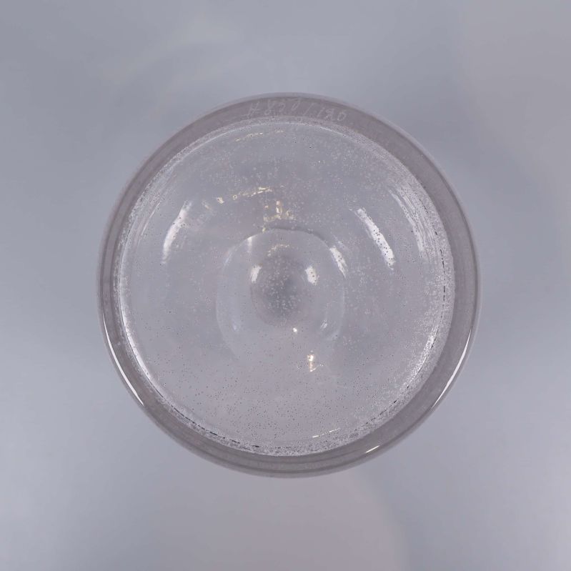 Glasvasens botten med bubblor sedd ovanifrån