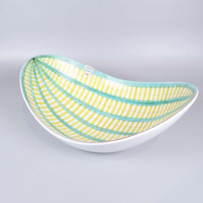 Oval skål med gul och turkos randig insida och vit utsida