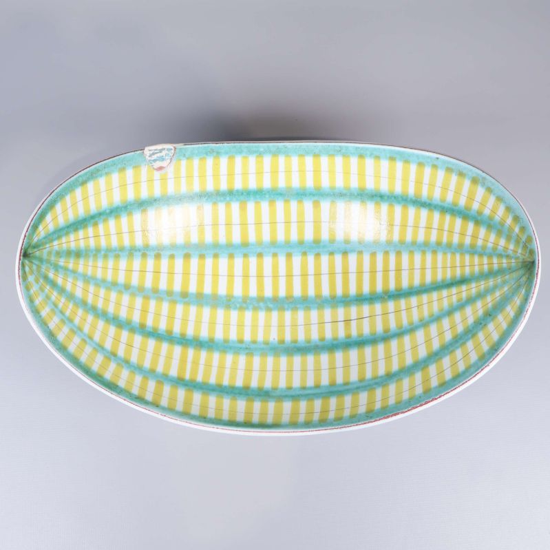 Överblick av skålens insida med gult och turkost mönster