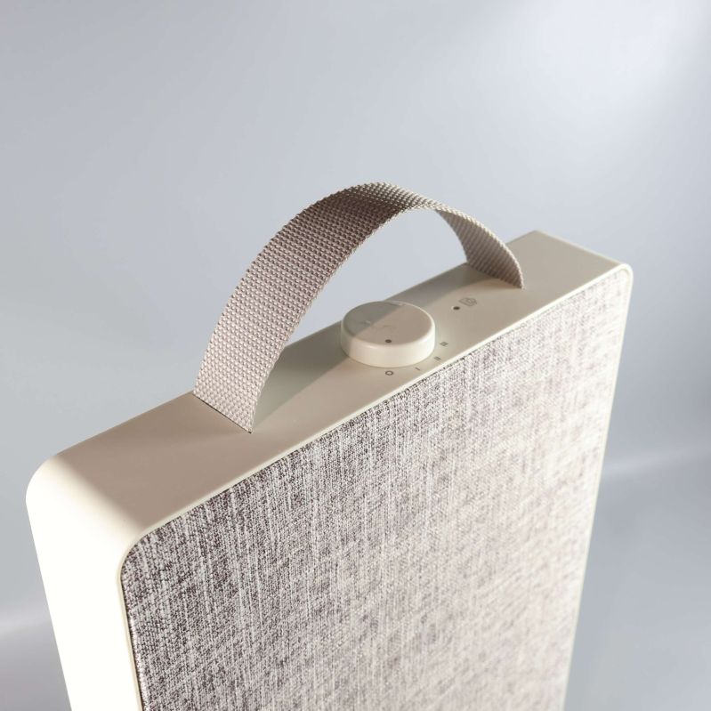 Närbild på luftrenarens topp med handtag och ratt