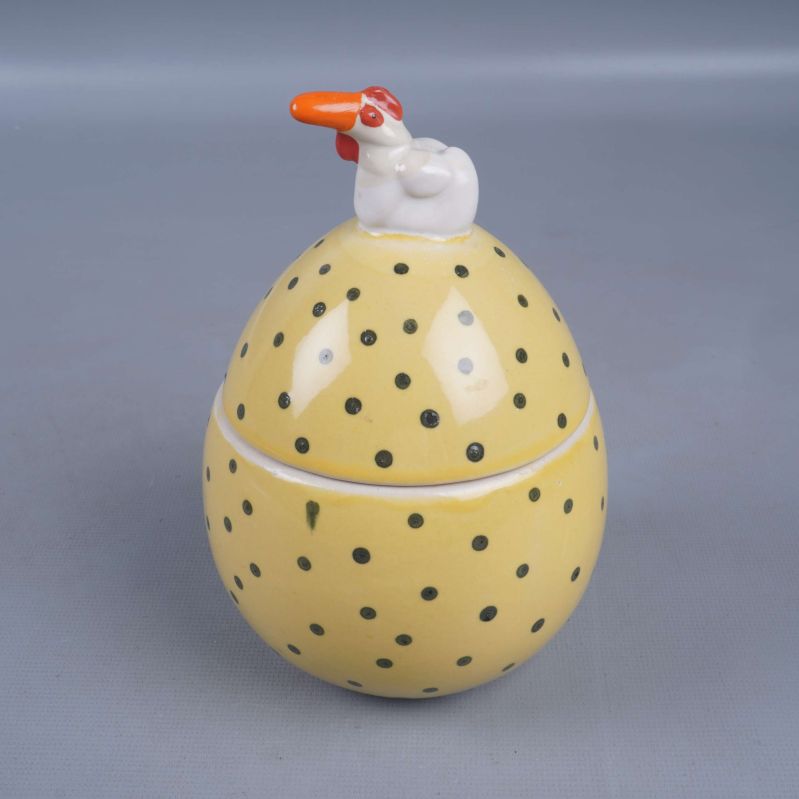 Äggformad prickig burk med höna på locket