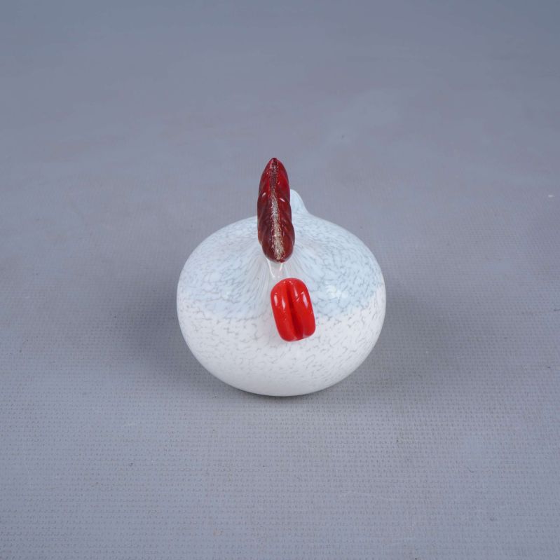 Glashöna sedd ovanifrån med tydlig röd kam