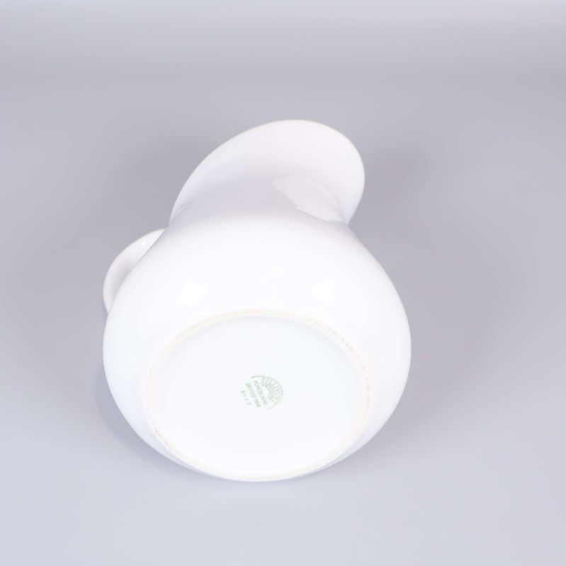 Kannans botten med stämpel från tillverkaren