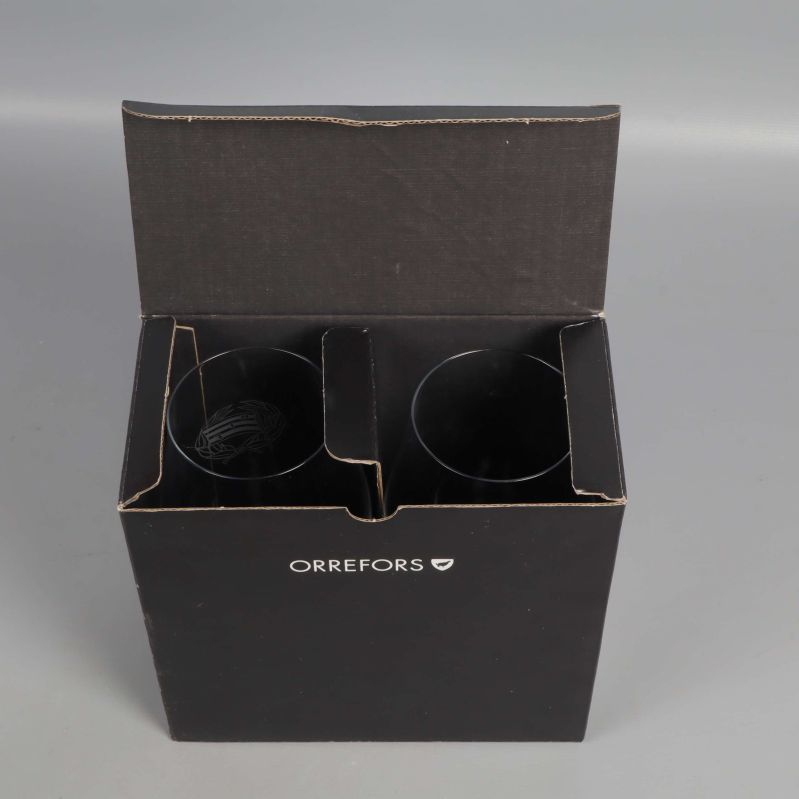Öppen Orrefors kartong med två glas inuti