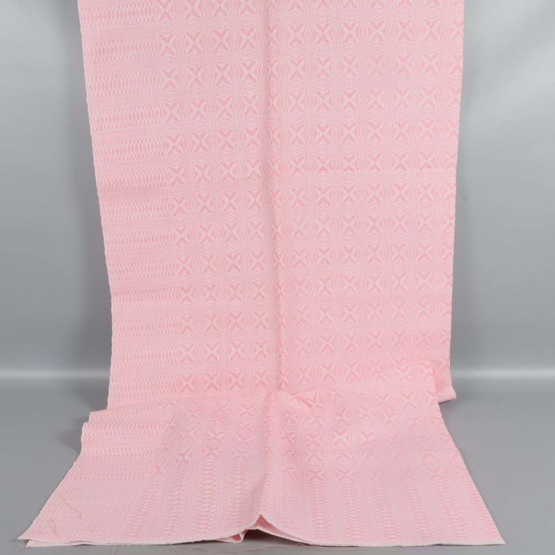 Helt utspritt tyg i ljusrosa med mönster