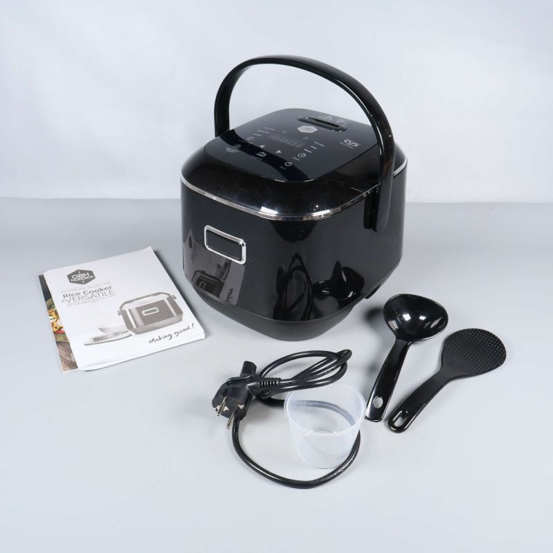 Komplett riskokare med tillbehör och manual