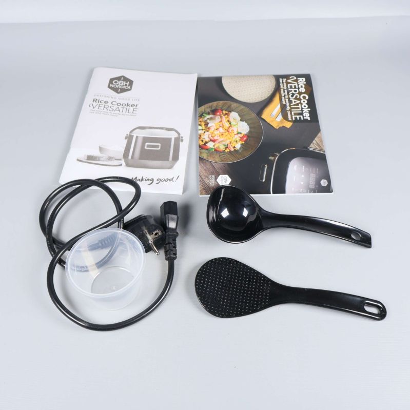 Tillbehör till riskokare; slev, sked, måttbägare och sladd