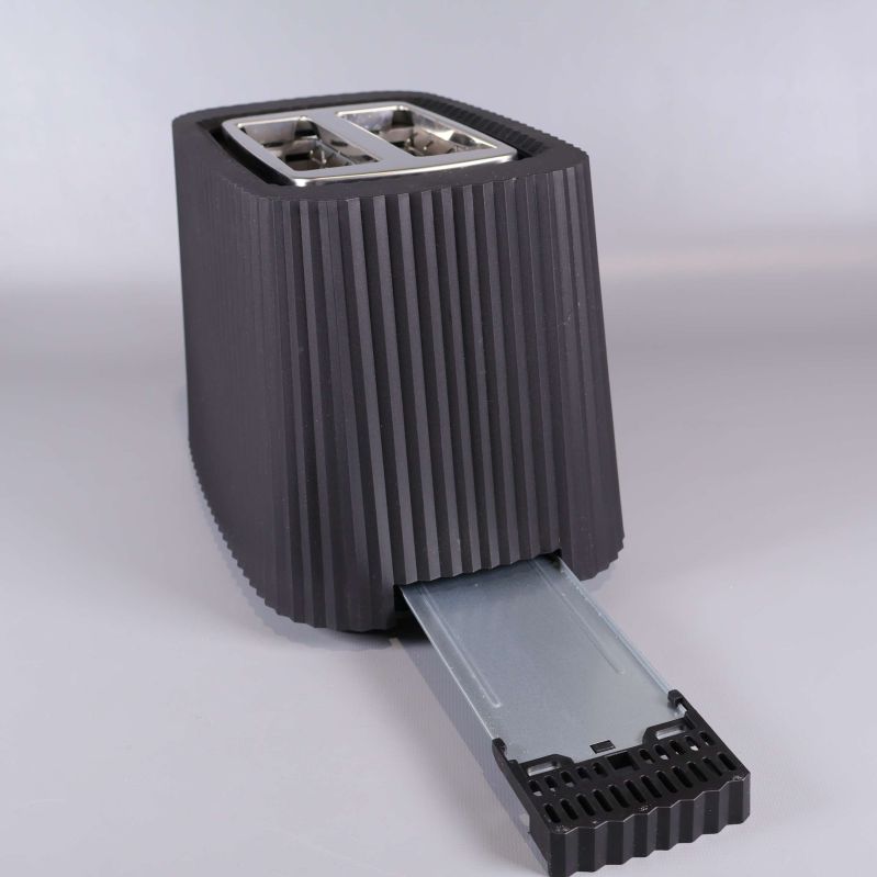 Brödrost med utdragen smulbricka längst ner