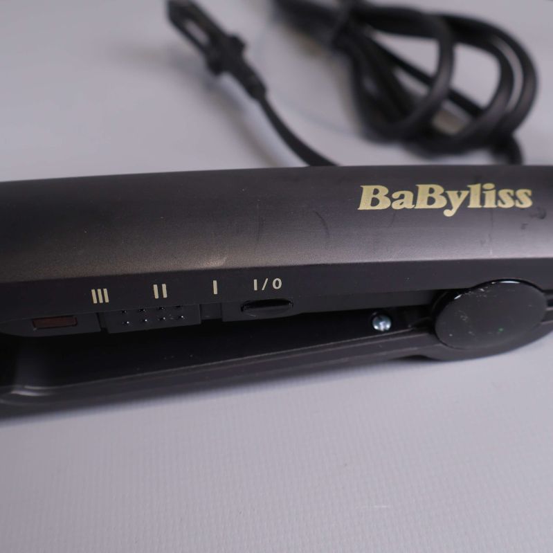 Närbild på handtaget till vågstylern med värmereglering