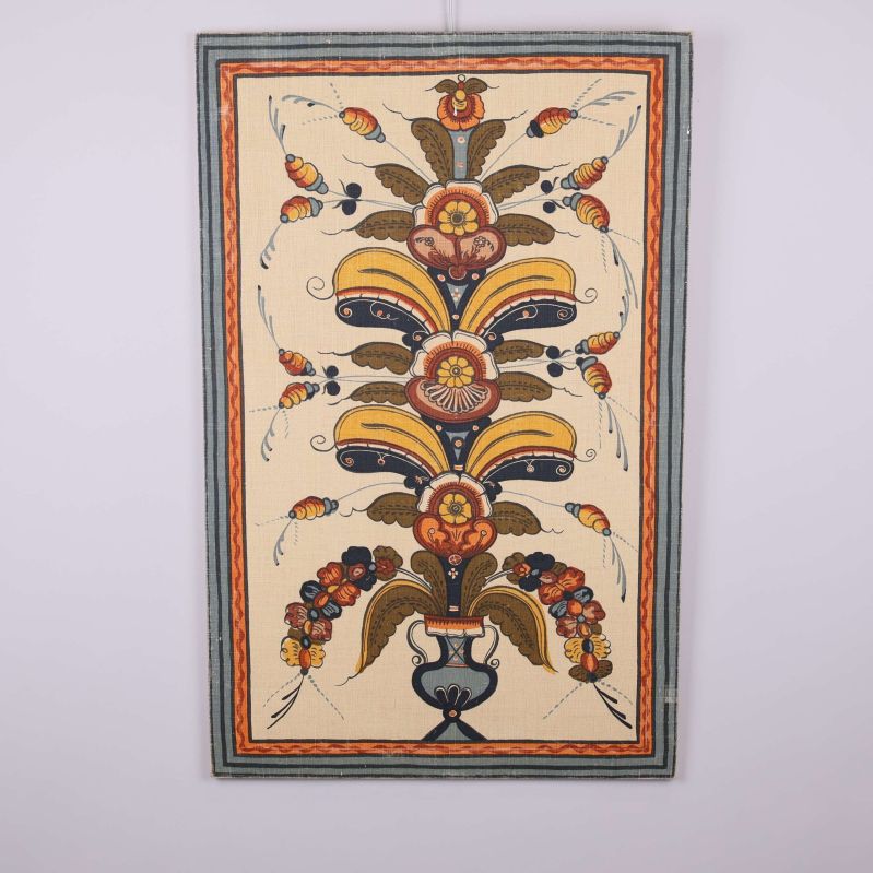 Brodyrbonad med färgstarka blommor och blad i ram