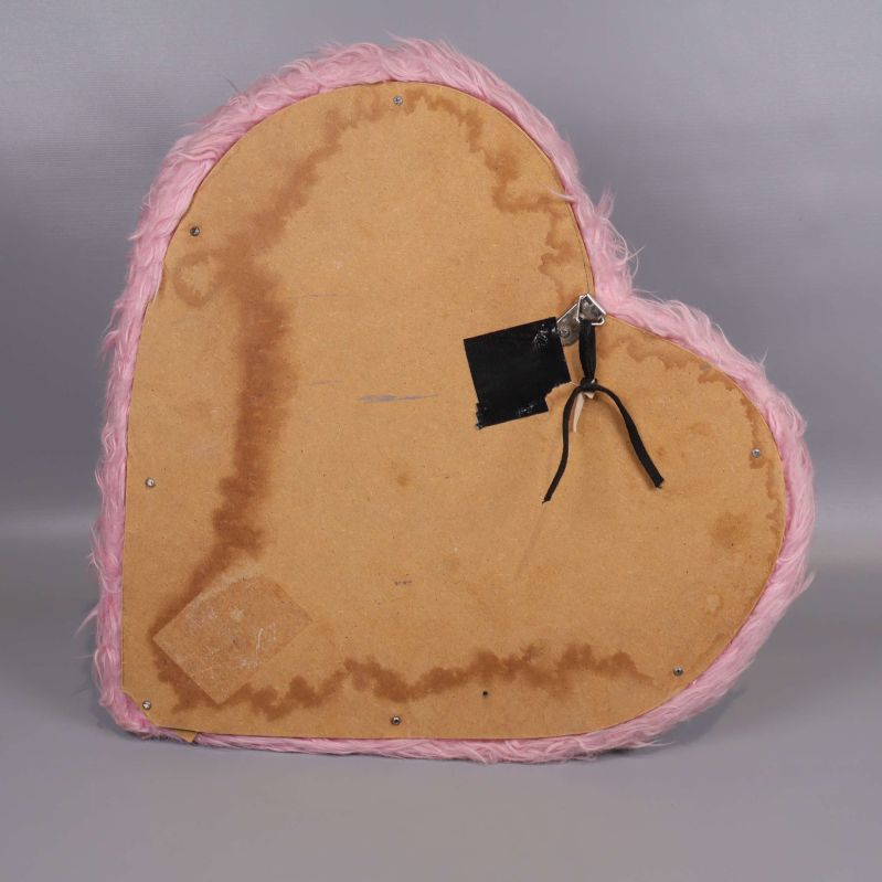 Baksidan på hjärtspegeln med upphängning och träskiva