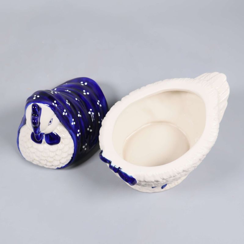 Keramikhöna burk öppen med lock avtaget