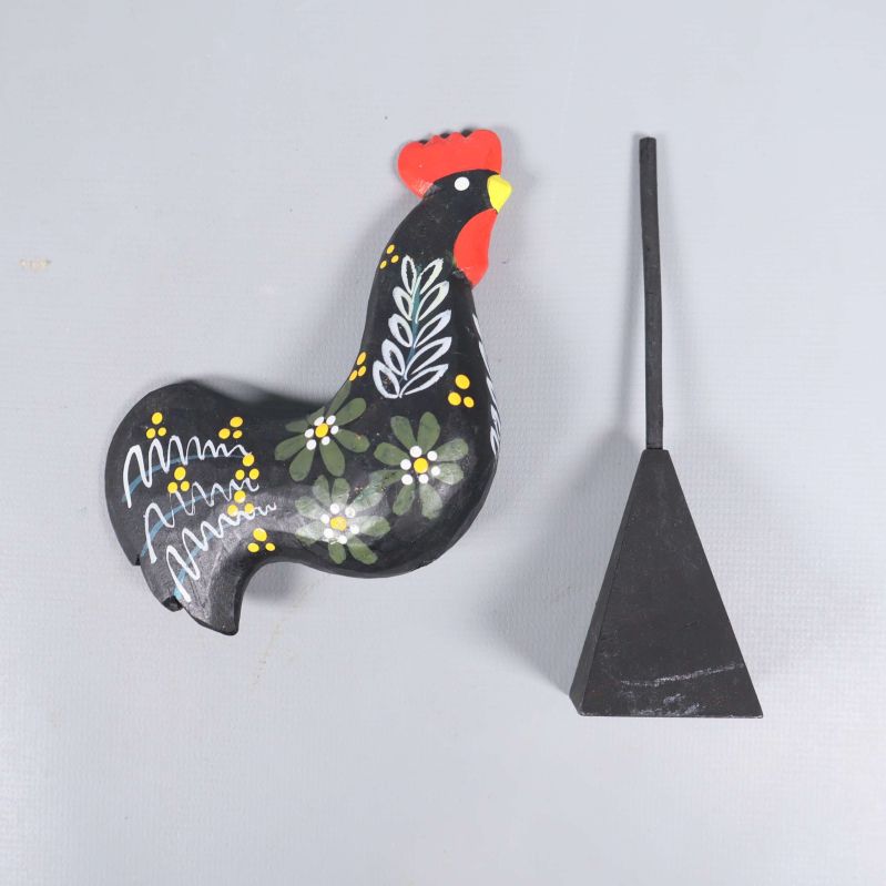 Tuppfiguren isärplockad med kropp och fot separat