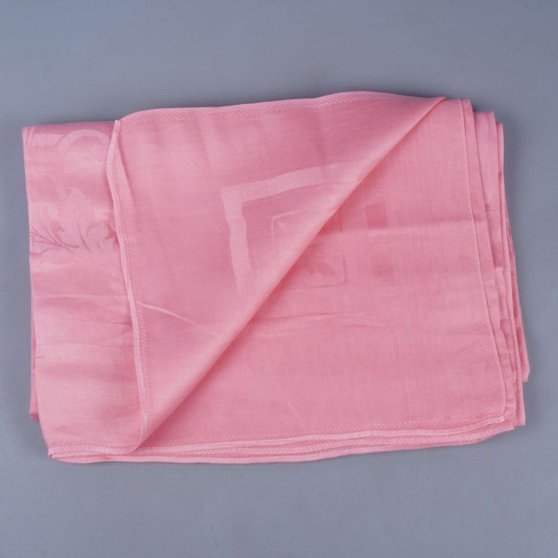 Ljusrosa bordduk delvis vikt för att visa detalj