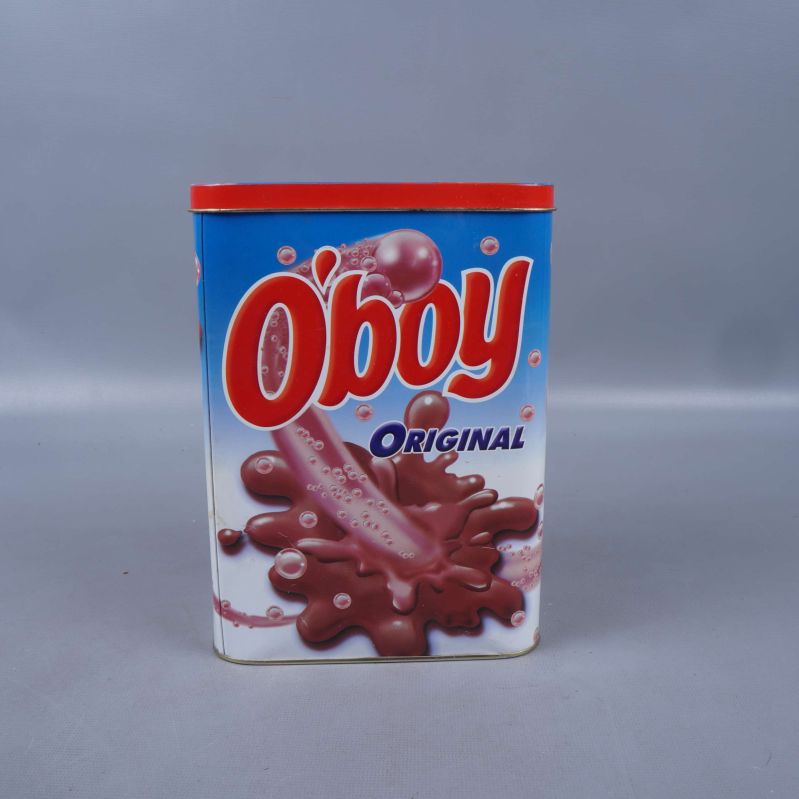 Framifrån O'boy metallburk med rödlackat lock