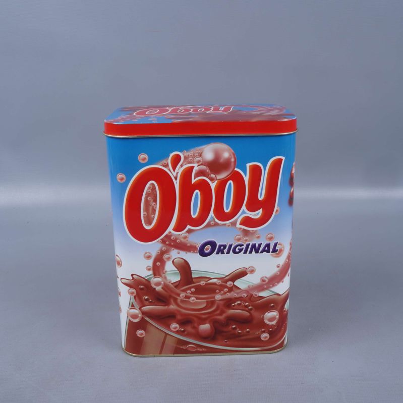 Metallburk med O’boy Original-design, blå bakgrund och rött lock