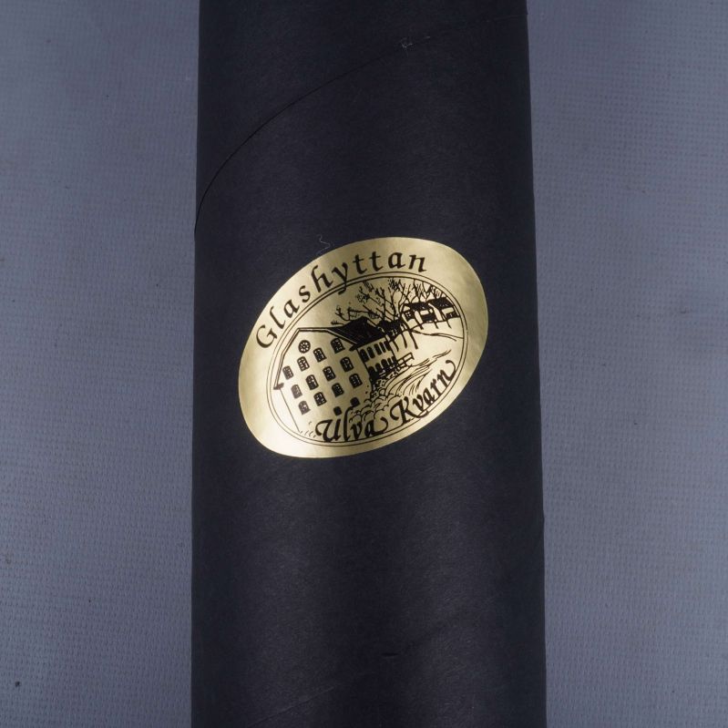 Gulddekal med Glashyttan Ulven Kuvan på svart tub