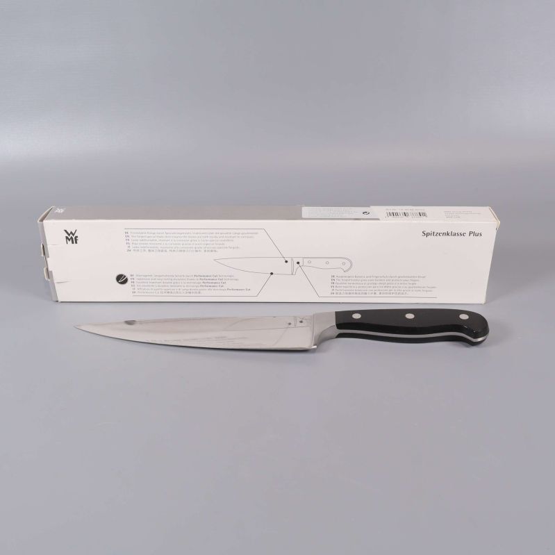 Kockkniv och förpackning med produktinformation