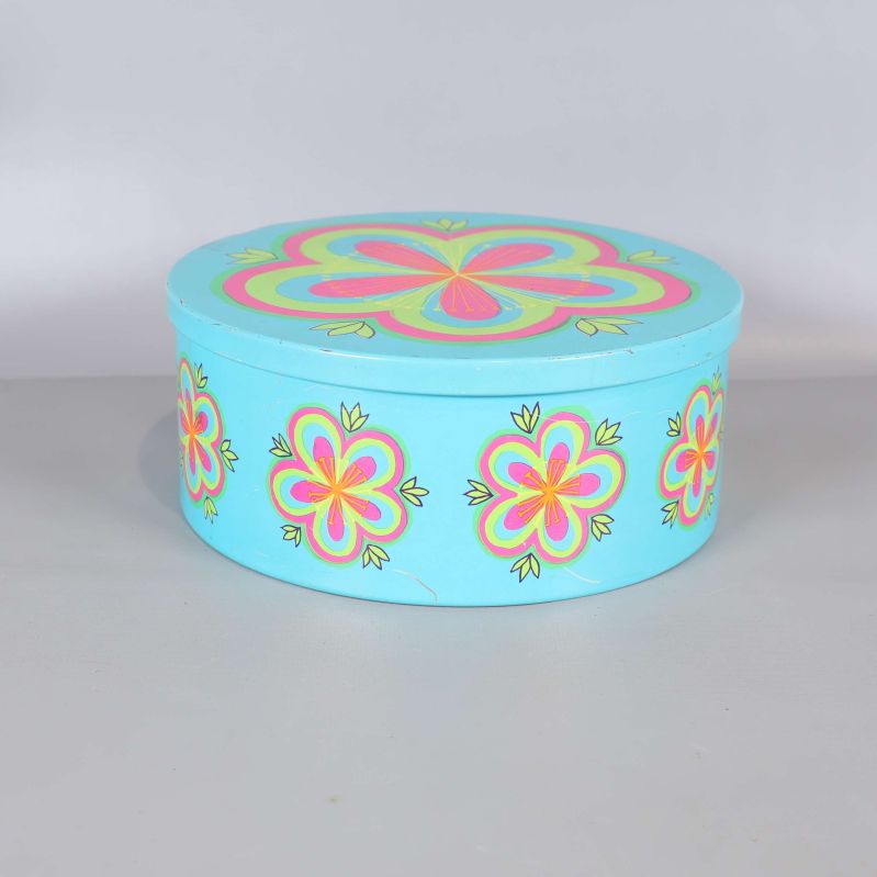 Rund turkos burk med färgglada blommor och lock