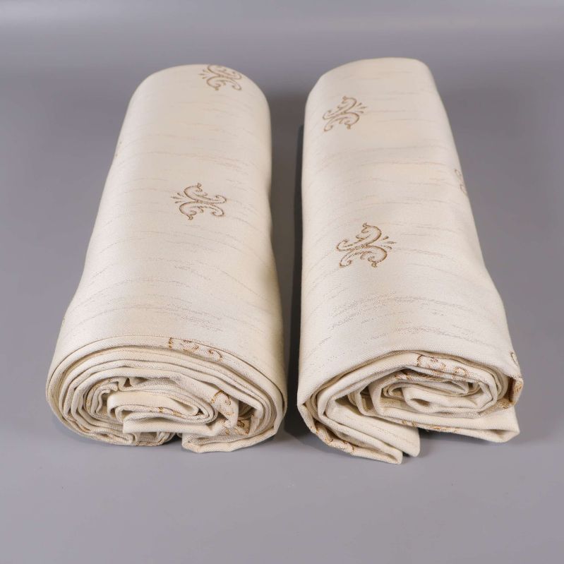 Två upprullade gardinlängder bredvid varandra