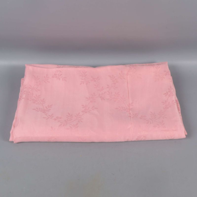 Hopvikt rosa duk med blommönster på grå bakgrund