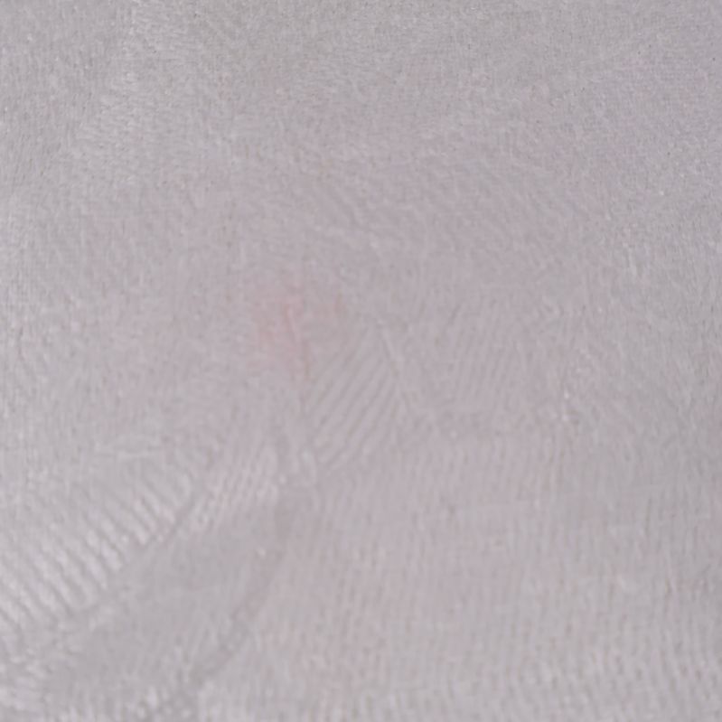 Närbild av fläck på vit duk