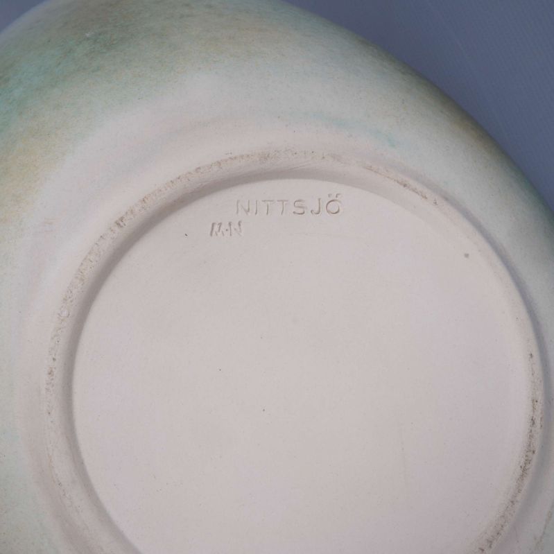 Närbild av stämpel med texten NITTSJÖ
