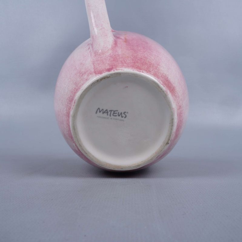 Koppens botten visar texten Mateus