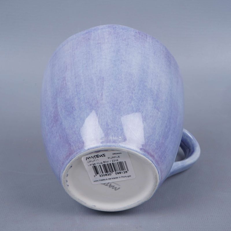 Kopp liggande på sidan med etikett undertill