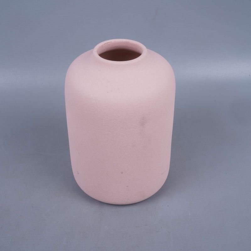 Matt ljusrosa vas med rund öppning