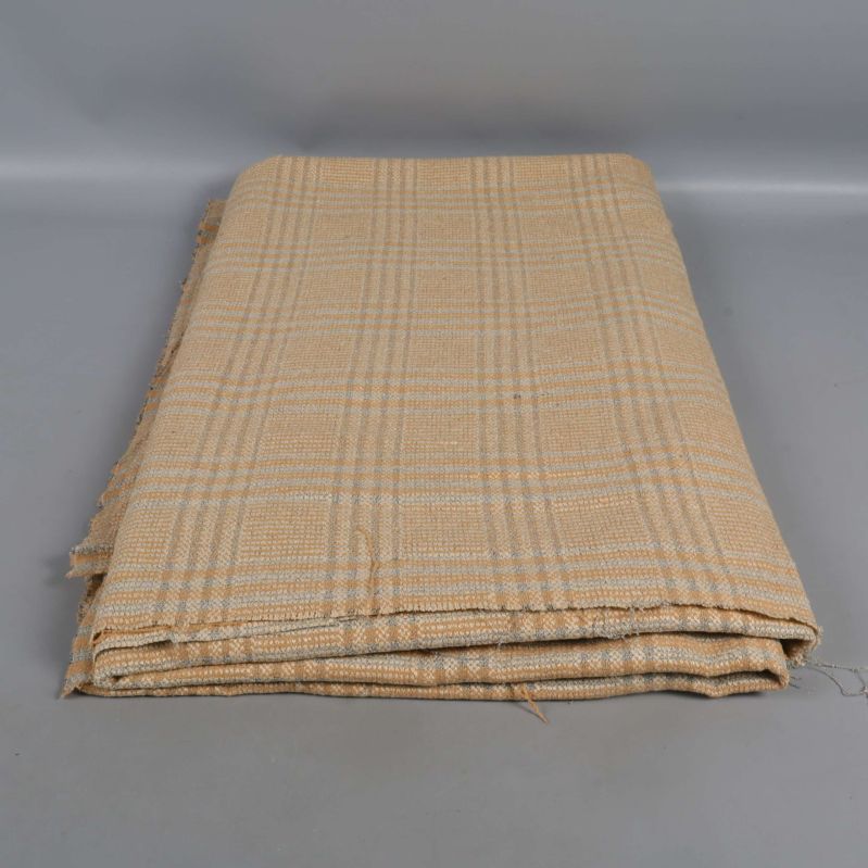 Vikt rutigt tyg i beige och gula toner